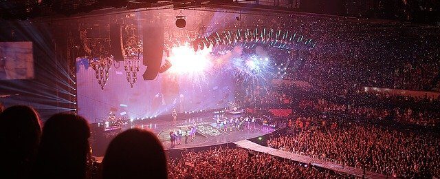 an image of a big concert that can be hosted only by a popular band